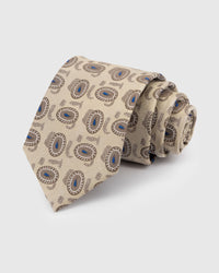 STICKYZOO Sandstone Paisley Tie in hand-embroidered mulberry silk with azure paisley medallions on sandstone ground, 45° bias-cut Italian method