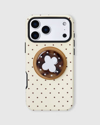 Buttercream phone case with chocolate polka dots and a tortoiseshell MagSafe grip with silver clover by STICKYZOO