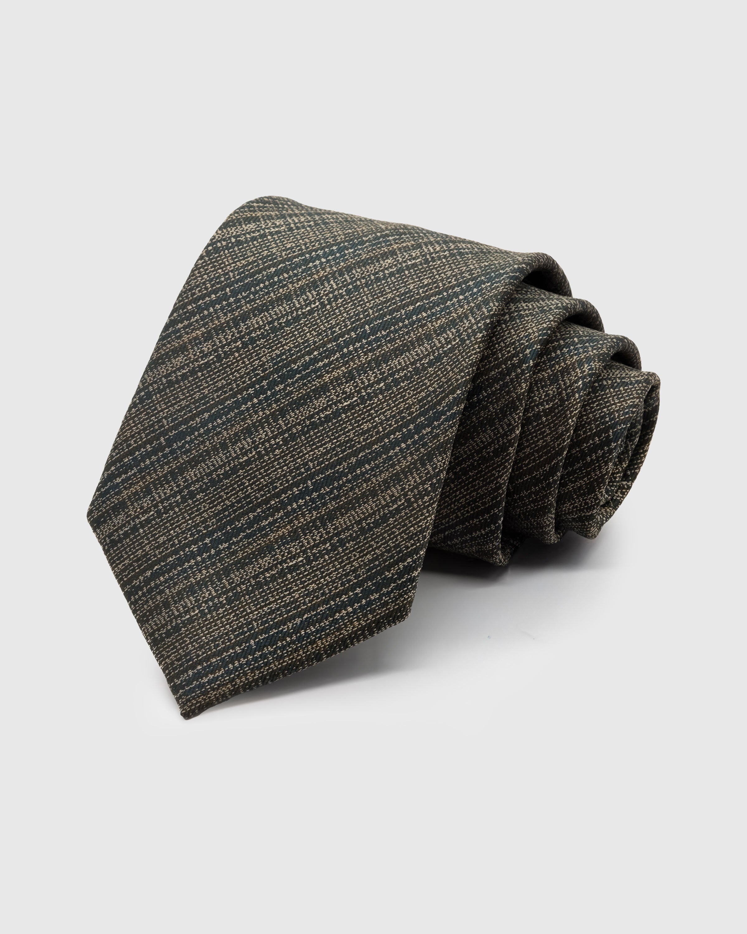 MOSS GLEN PLAID TIE — Hand-embroidered glen plaid detail on 100% mulberry silk in moss, showing embroidery texture and silk sheen