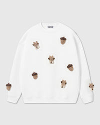 STICKYZOO Reindeer and Acorn Plush Sweatshirt in white with seven hand-stitched woodland appliques