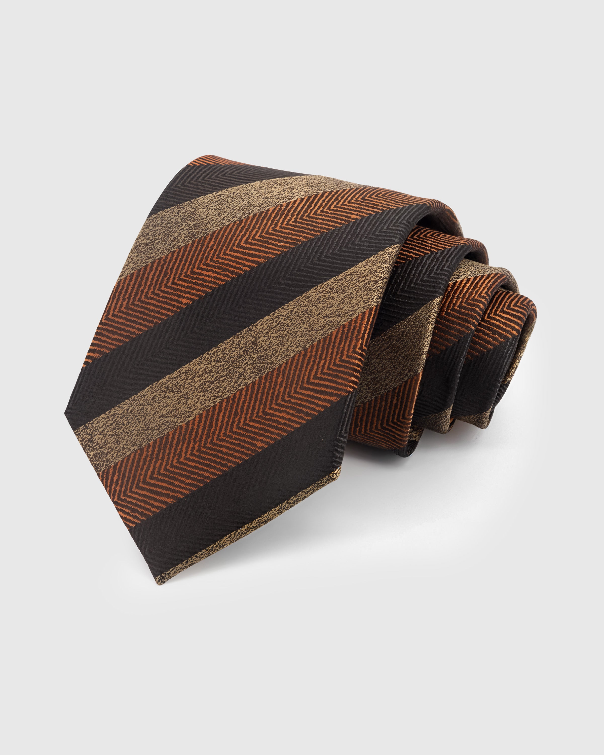 ESPRESSO HERRINGBONE TIE — Hand-embroidered herringbone stripe detail on 100% mulberry silk in espresso, showing embroidery texture and silk sheen