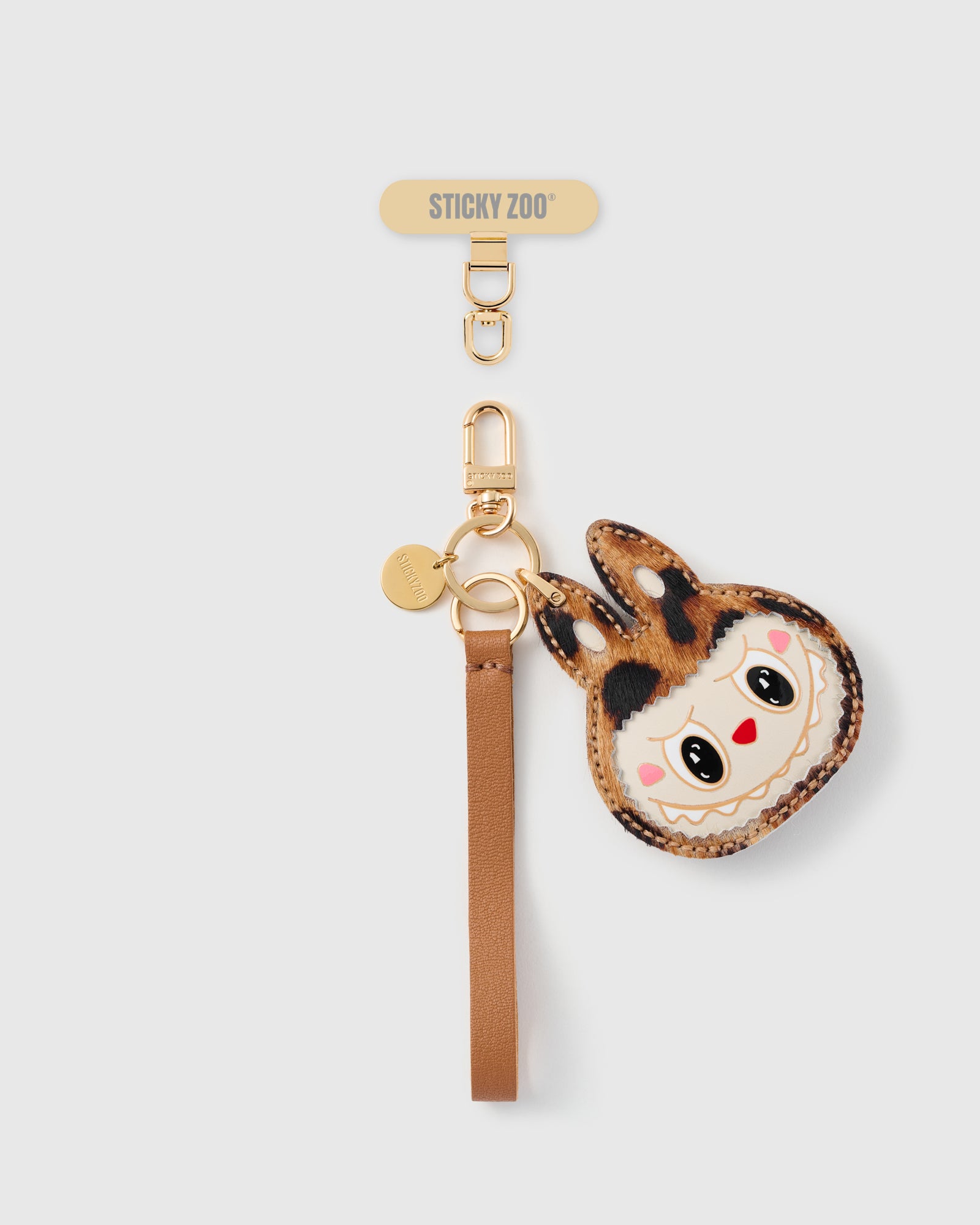 STICKYZOO cognac leopard critter leather phone strap flat, leopard calf-hair character charm on pebbled Alran leather with gold hook