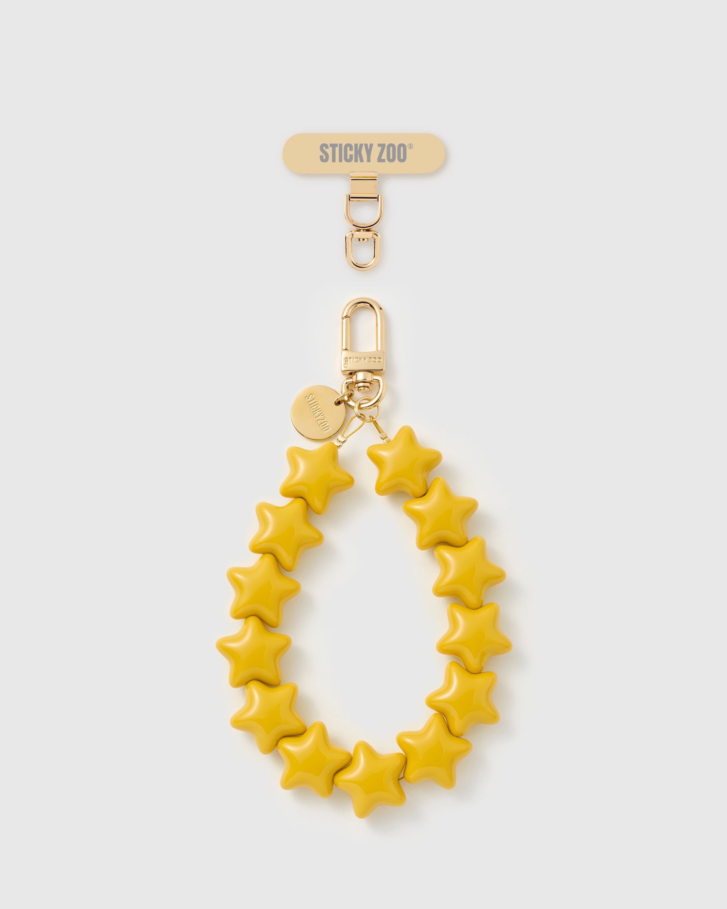 Handmade honey-gold five-point star bead phone strap with 18K gold-plated carabiner and engraved STICKYZOO disc — Rated 4.9 stars