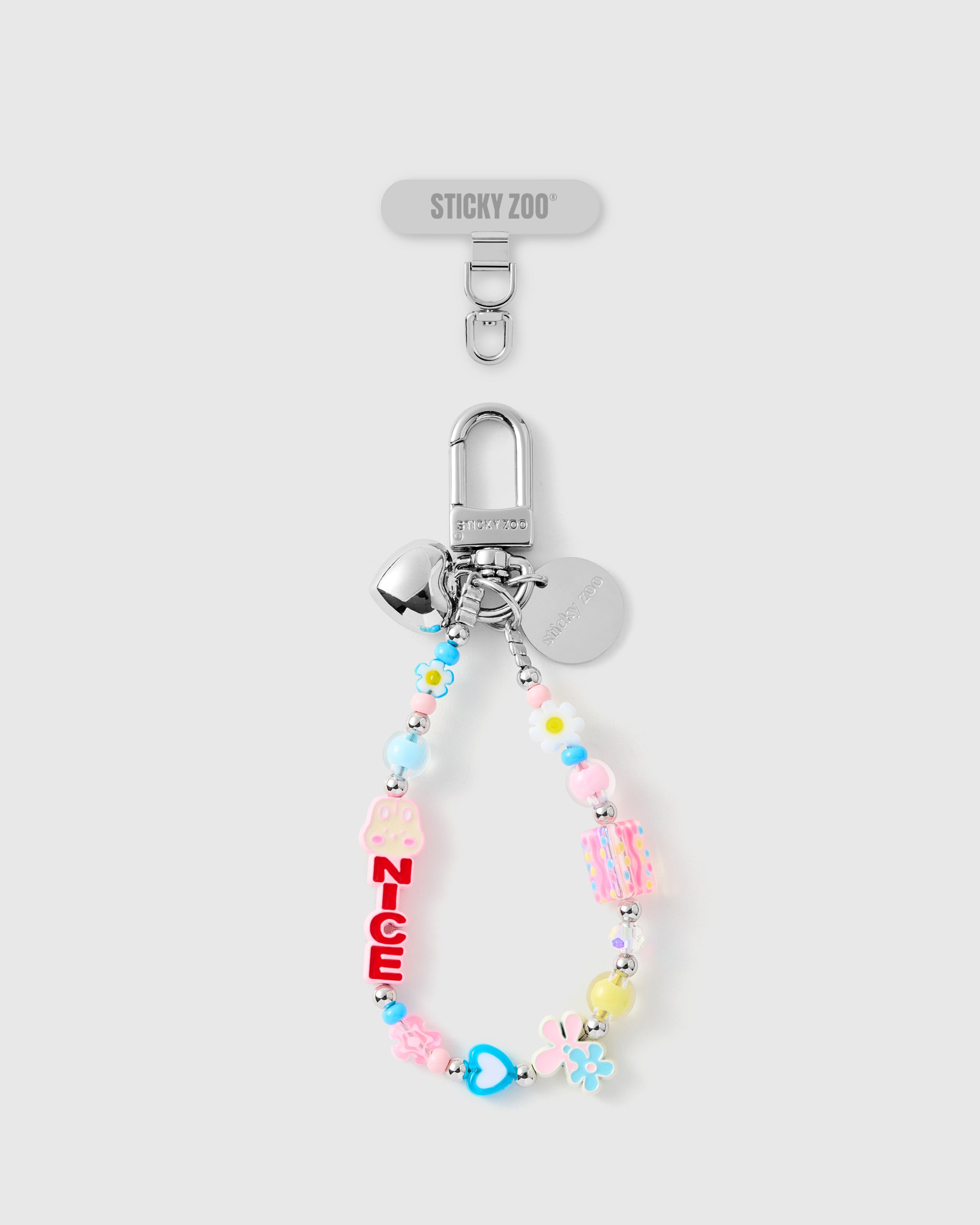 Handmade blush flower cluster phone strap with pastel beads and silver-tone hardware by STICKYZOO