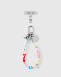 Handmade blush flower cluster phone strap with pastel beads and silver-tone hardware by STICKYZOO