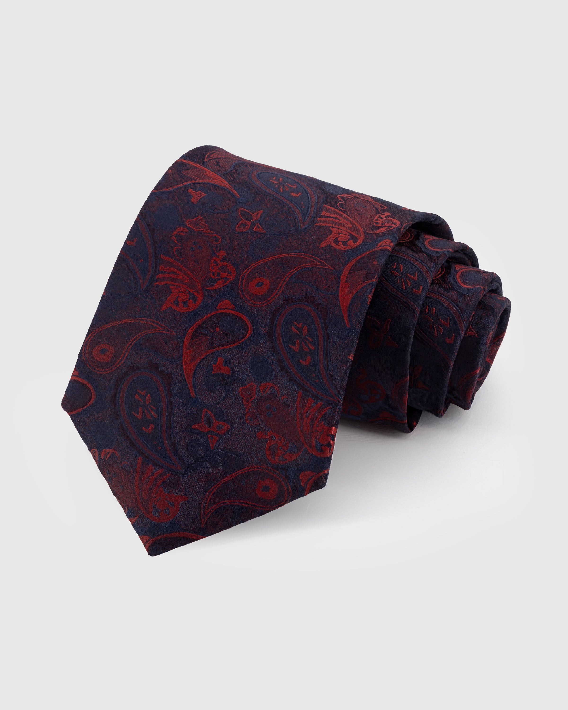 STICKYZOO MIDNIGHT SCARLET PAISLEY TIE — 100% mulberry silk with hand-embroidered scarlet red paisley scrollwork motifs on deep midnight navy ground