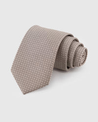 STICKYZOO Pearl Micro Tie in hand-embroidered mulberry silk with tonal micro circle pattern, 45° bias-cut Italian method
