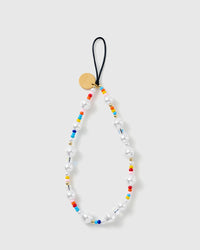 STICKYZOO beaded phone strap laid flat, white faux-pearls with rainbow seed beads, gold accents and a black cord loop with a gold disc.