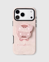Pale pink phone case with a pearlescent butterfly MagSafe grip and red "transform" script by STICKYZOO
