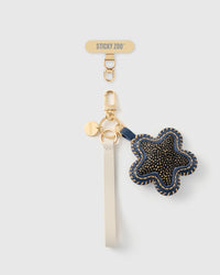 STICKYZOO midnight spotted star leather phone strap — gold-flecked calf-hair star in navy leather, ivory Alran strap, gold hardware