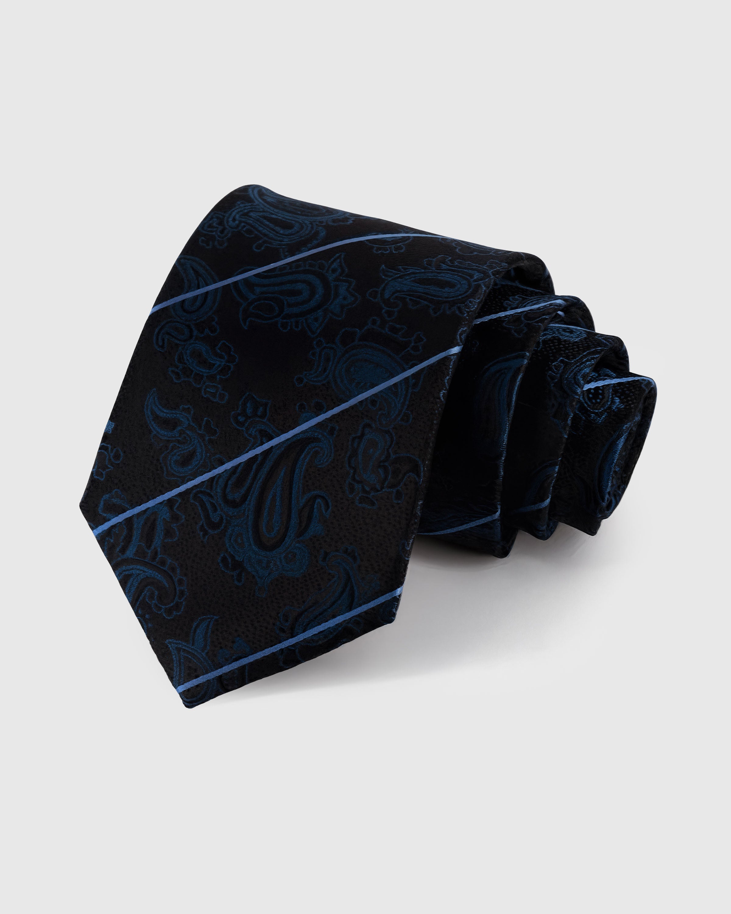 STICKYZOO ONYX PAISLEY STRIPE TIE — 100% mulberry silk with hand-embroidered blue tonal paisley with pale stripe dividers on deep onyx black ground