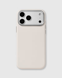 White fine-grain vegan leather iPhone case with a raised silver metal camera frame by STICKYZOO