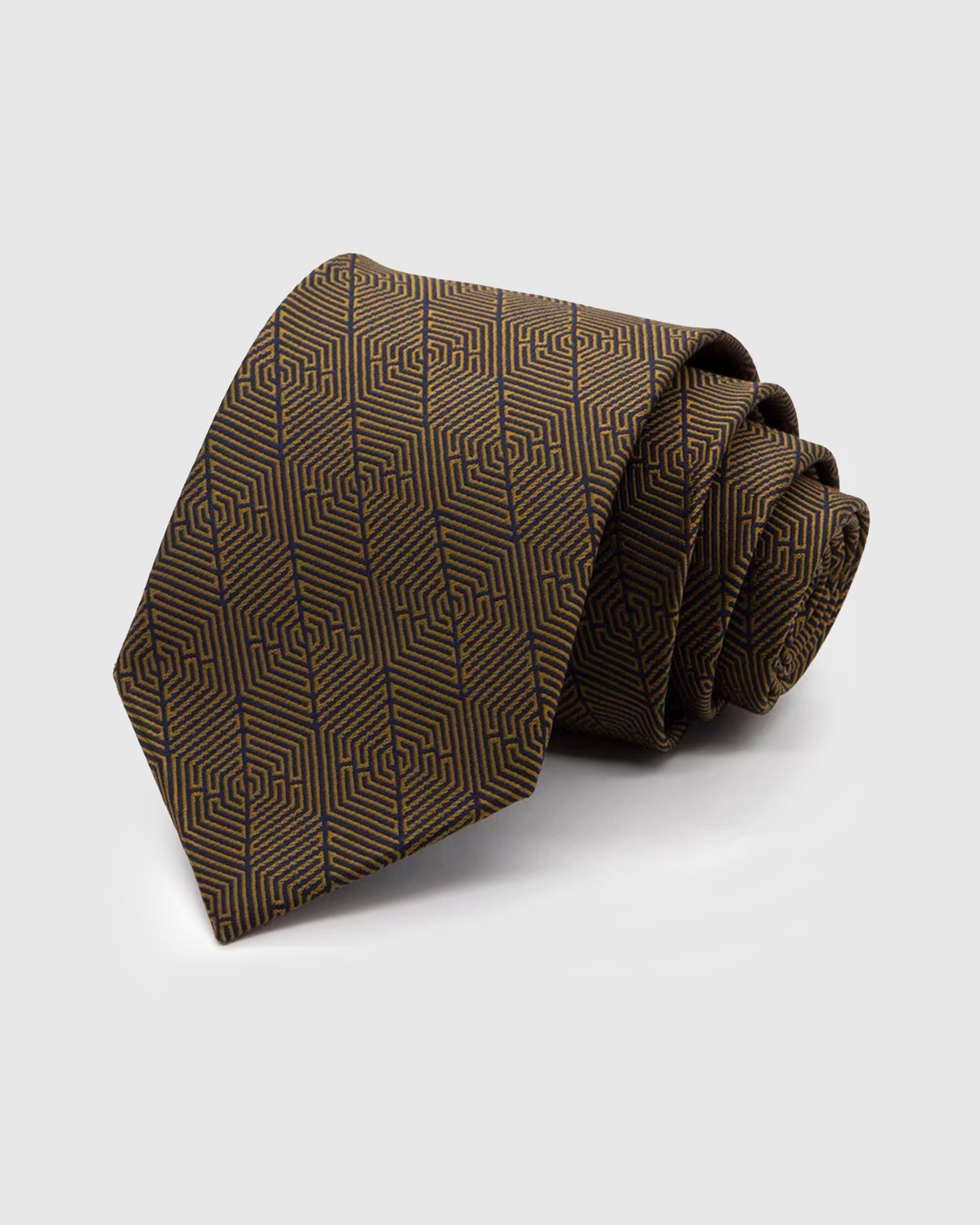 BRONZE GEOMETRIC TIE — Hand-embroidered geometric detail on 100% mulberry silk in bronze, showing embroidery texture and silk sheen