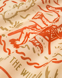 STICKYZOO desert lounge silk scarf showing the printed coyote and mountain motif in rust and olive ink
```