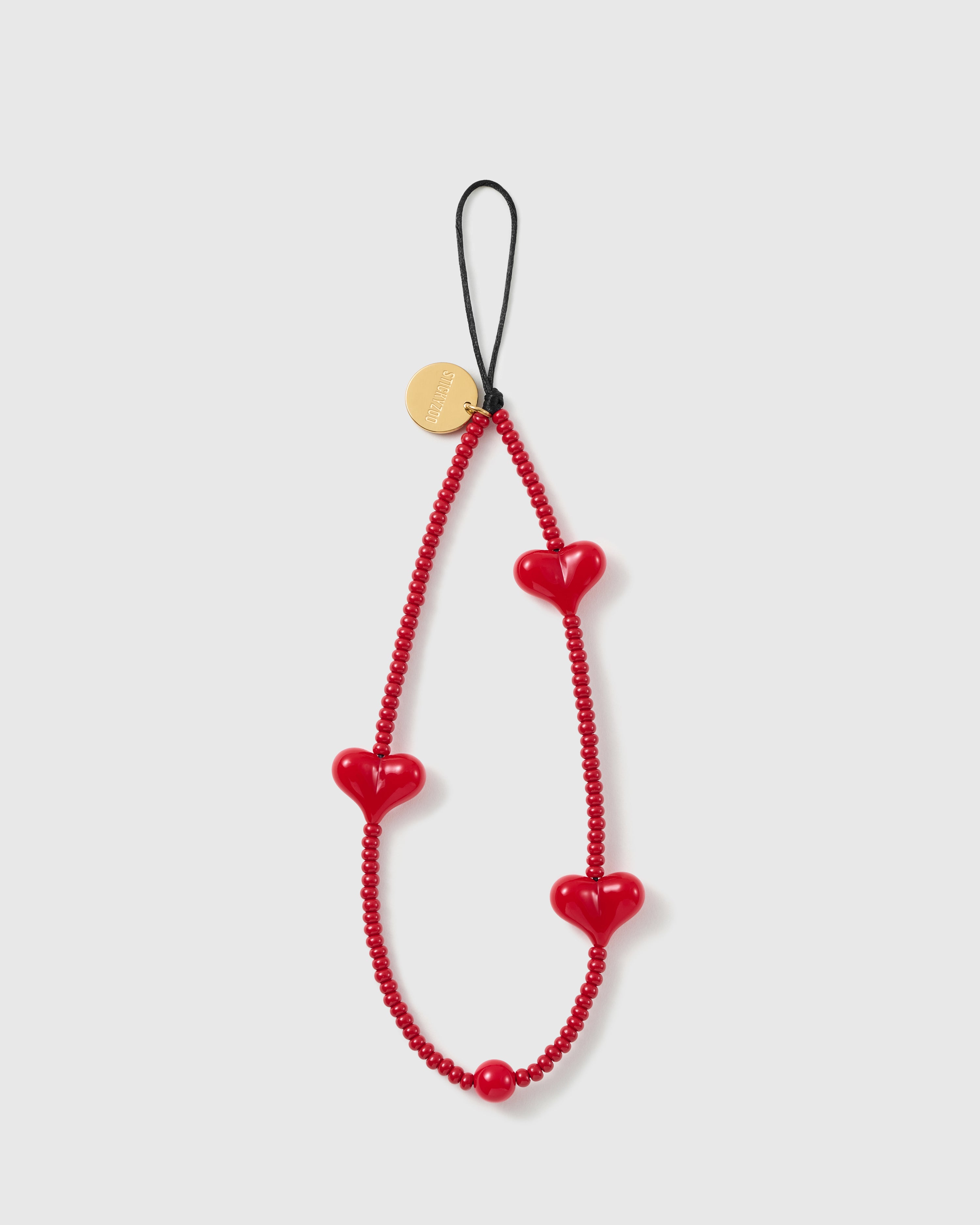 STICKYZOO scarlet puff heart phone strap, deep red beads with glossy heart beads and gold-tone disc