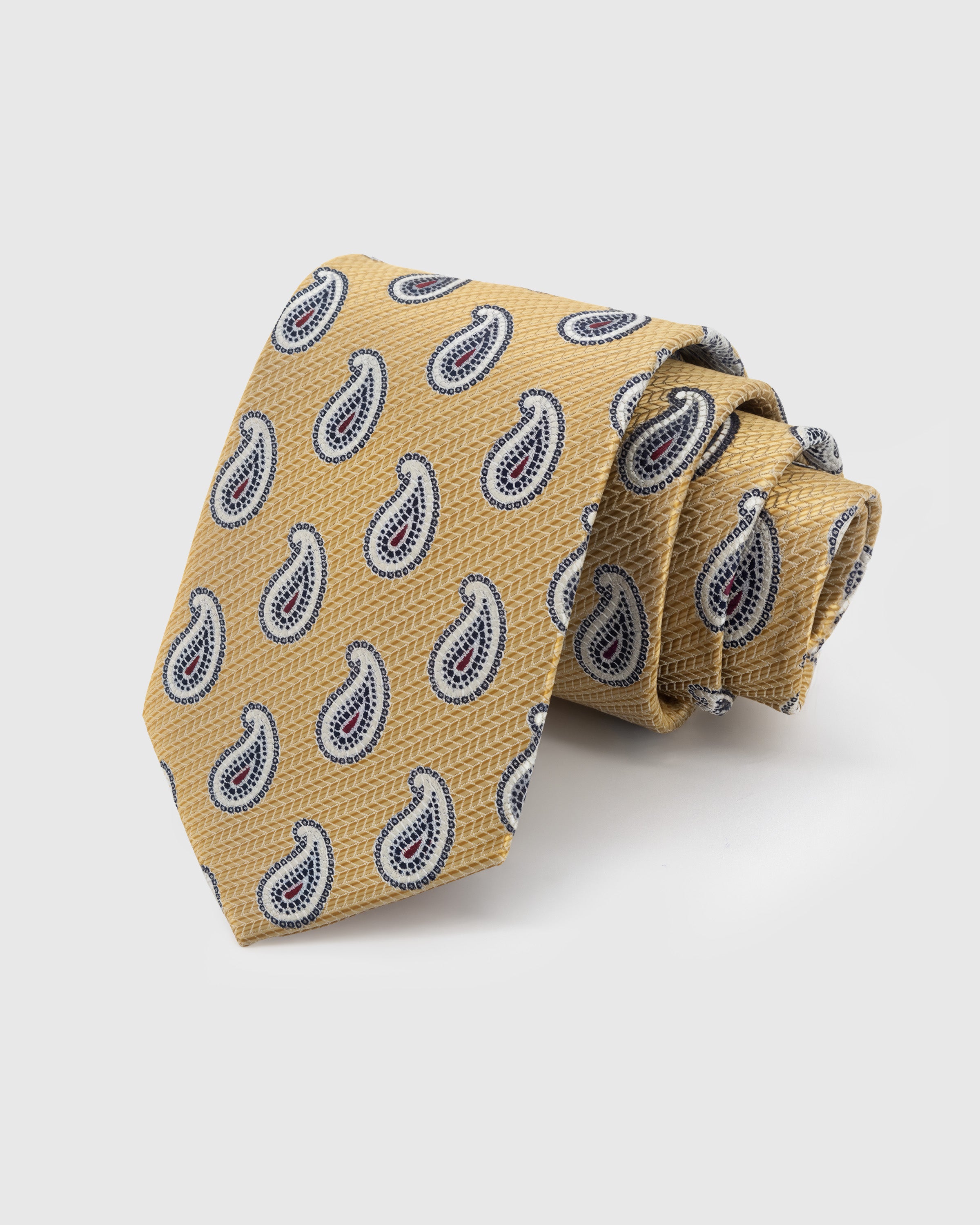STICKYZOO Saffron Paisley Tie in hand-embroidered mulberry silk with blue-red paisley motifs on herringbone ground, 45° bias-cut Italian method