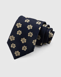 STICKYZOO Navy Blossom Tie in hand-embroidered mulberry silk with gold five-petal blossom motifs, 45° bias-cut Italian method