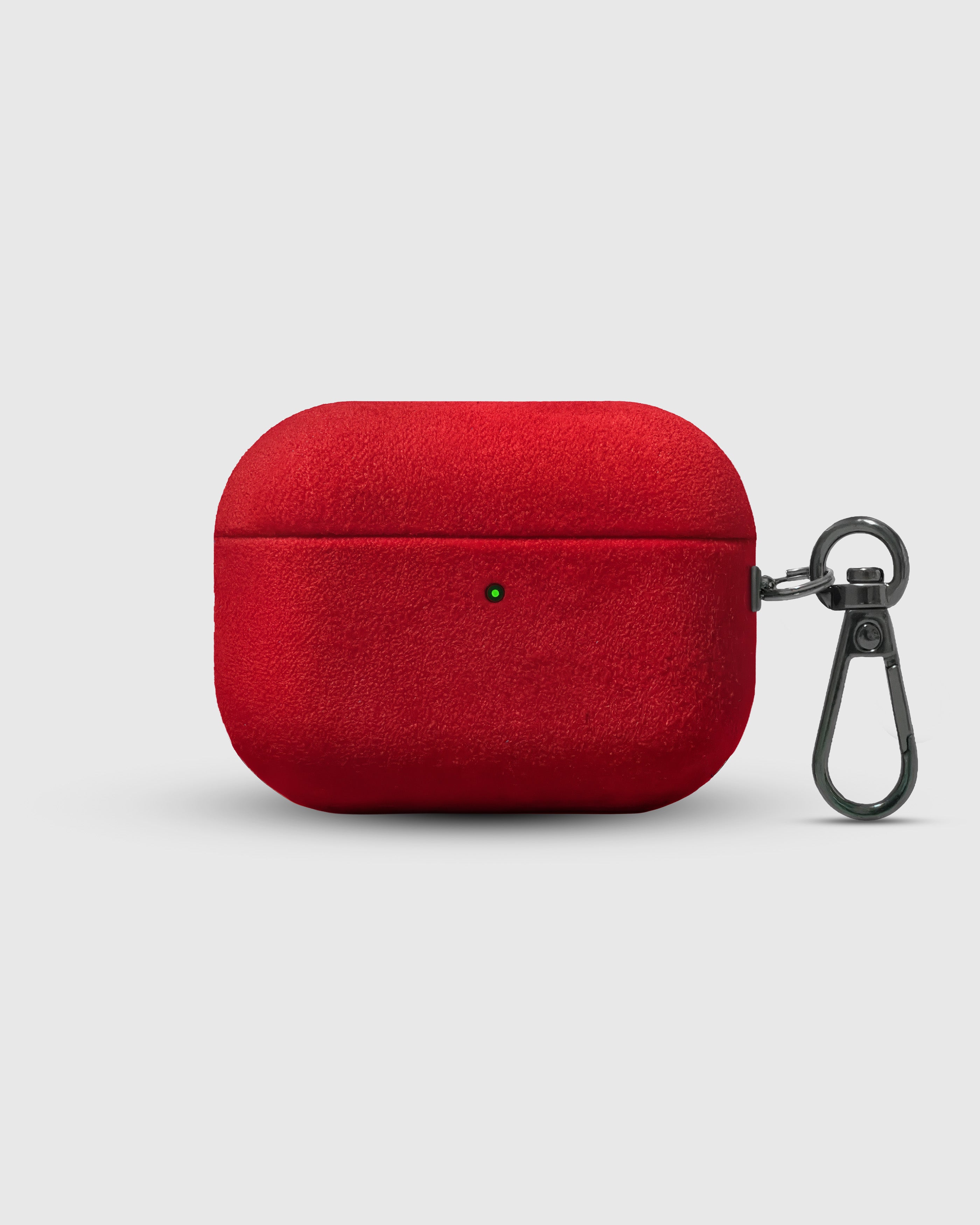 {{Scarlet Suede.}} Suede AirPods Pro Case in red with metal carabiner