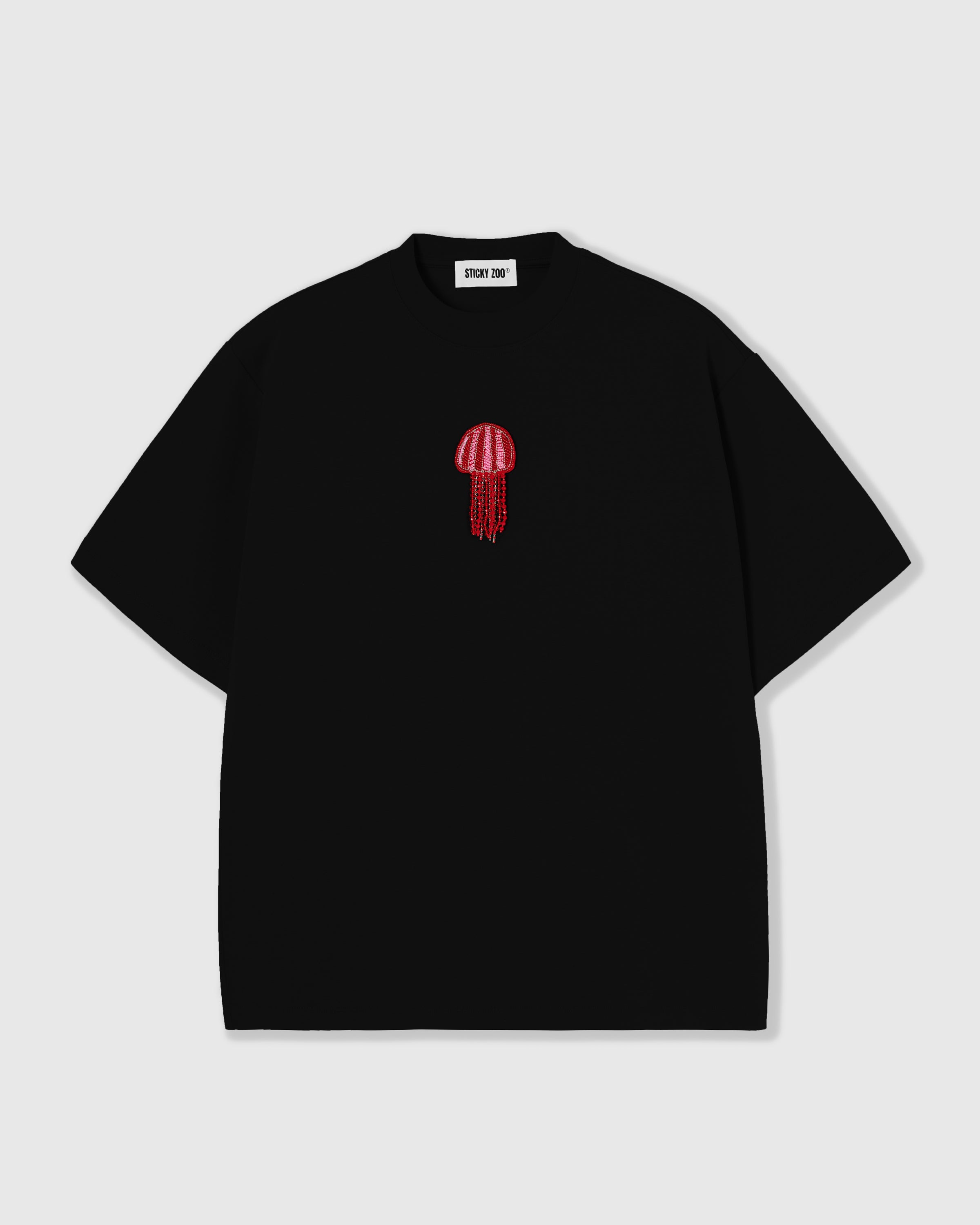 STICKYZOO Jellyfish T-Shirt in black, oversized boxy fit with a hand-beaded glass-bead jellyfish appliqué centered on the chest
