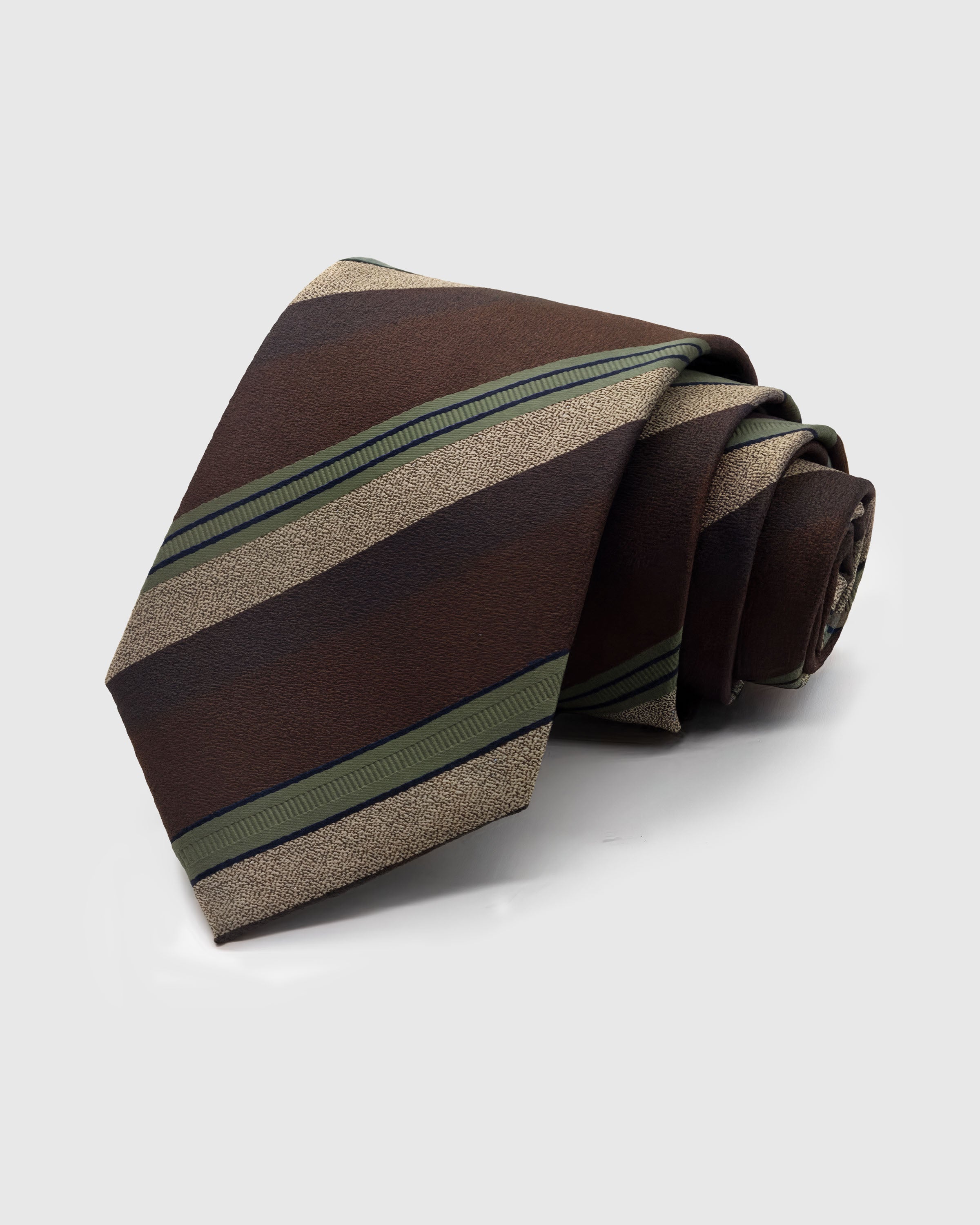 CHESTNUT REGIMENT TIE — Hand-embroidered regimental stripe detail on 100% mulberry silk in chestnut, showing embroidery texture and silk sheen