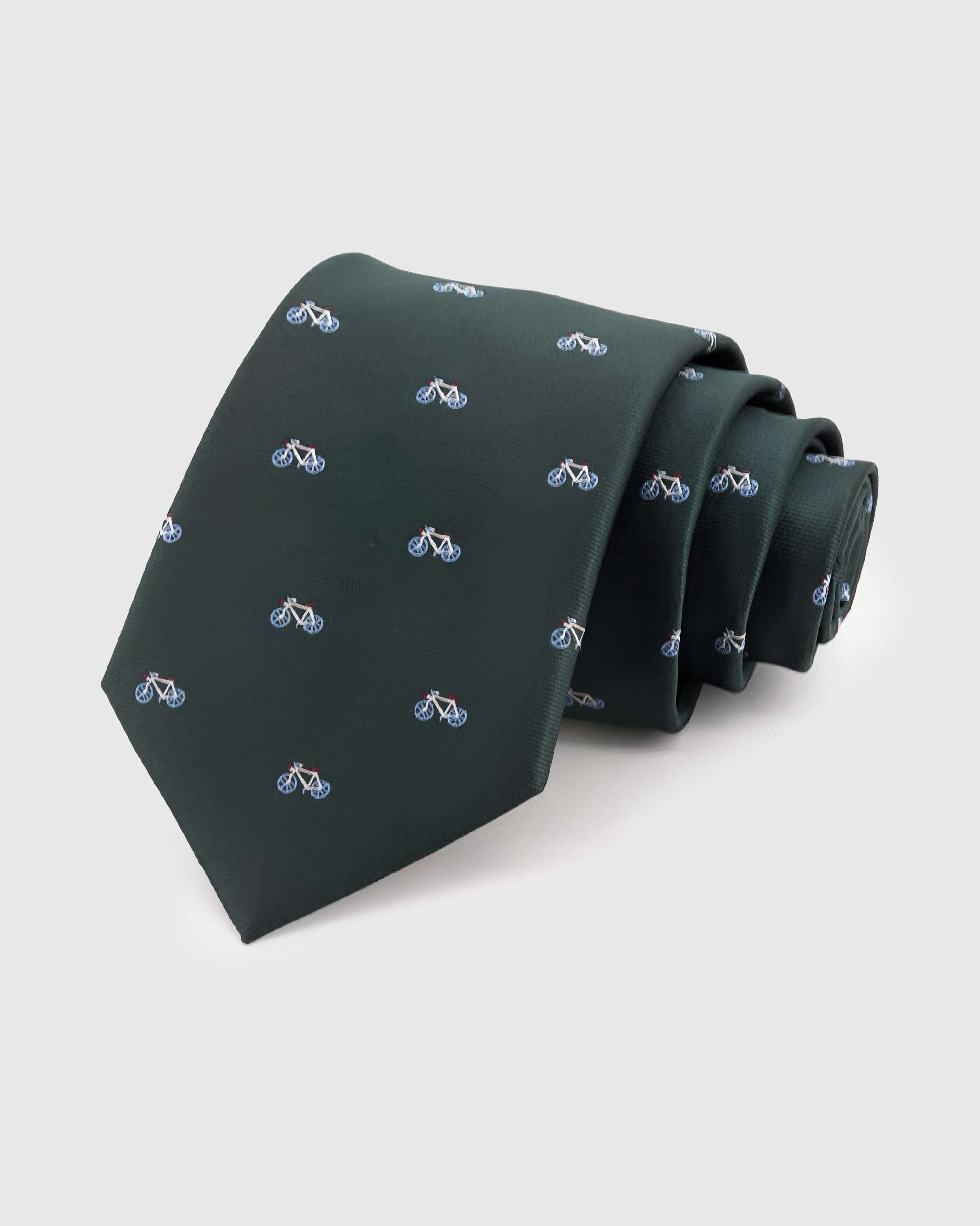 FOREST BICYCLE TIE — Hand-embroidered bicycle detail on 100% mulberry silk in forest green, showing embroidery texture and silk sheen