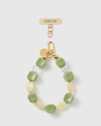 Handmade matcha marbled bead phone strap by STICKYZOO with 18K gold-plated engraved hardware