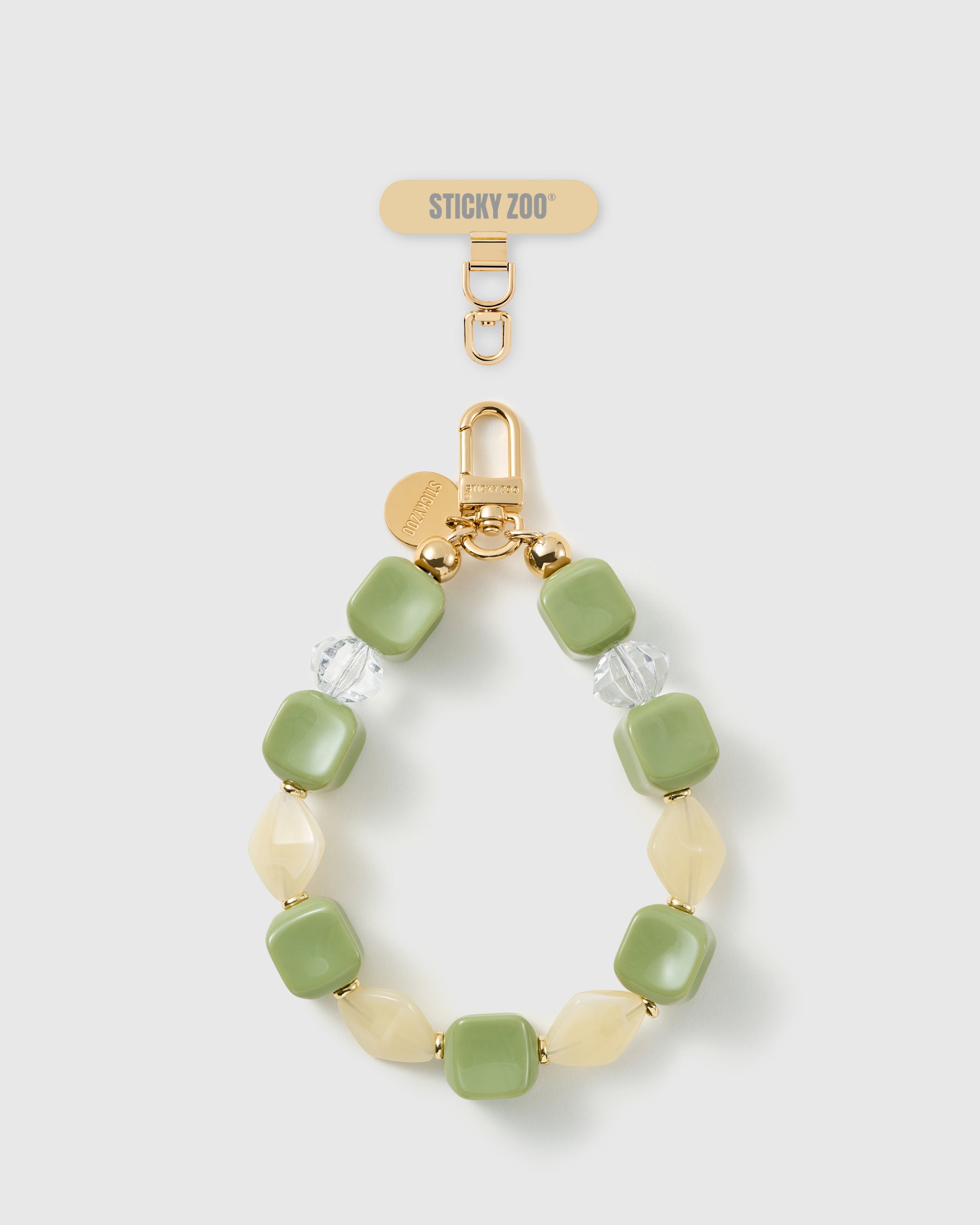 Handmade matcha marbled bead phone strap by STICKYZOO with 18K gold-plated engraved hardware