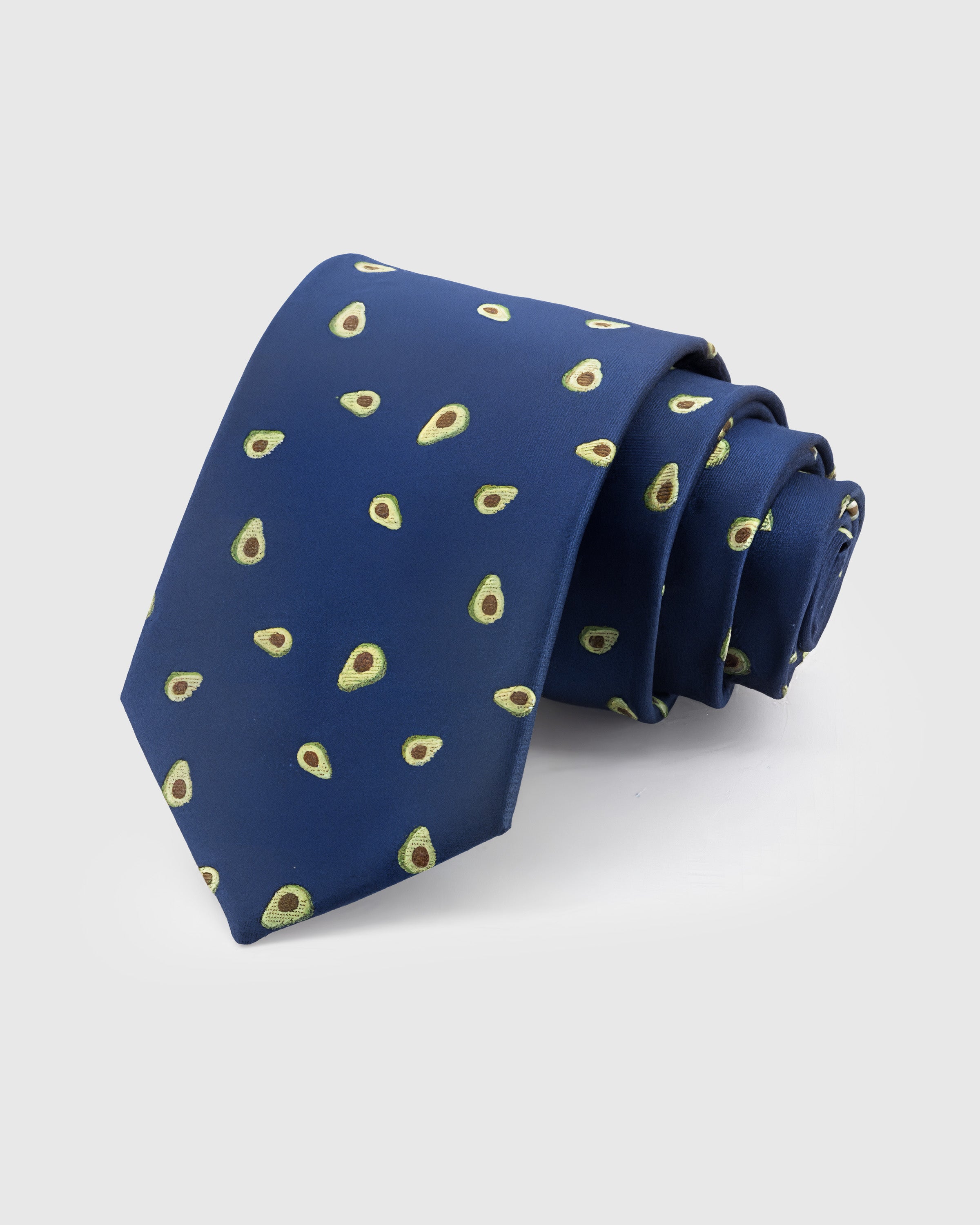 STICKYZOO Cobalt Avocado Tie in hand-embroidered mulberry silk with green avocado half motifs on royal blue ground, 45° bias-cut