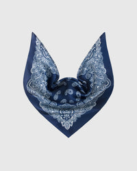 Indigo silk scarf opened into a triangular drape showing the corner paisley medallions and central field