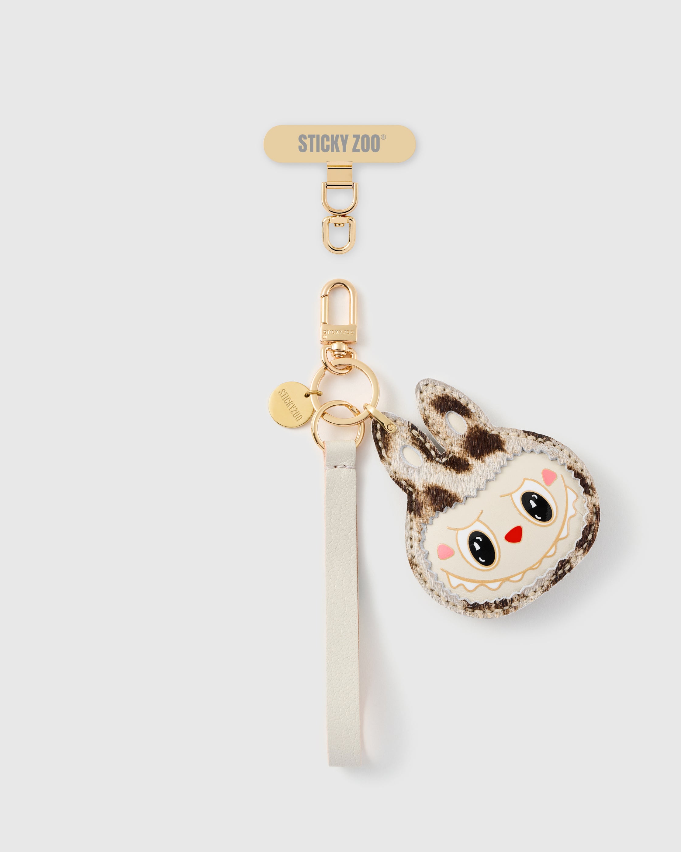 STICKYZOO snow-leopard leather phone strap — ivory Alran strap, calf-hair heart charm and gold hardware