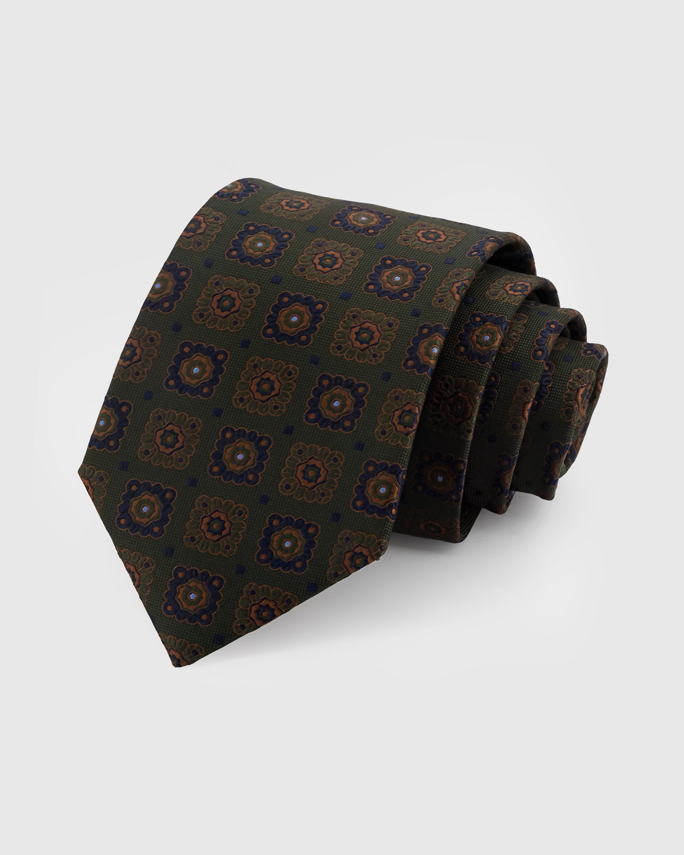 STICKYZOO OLIVE MOSAIC TIE — 100% mulberry silk with hand-embroidered ornate medallion motifs in copper, navy, and gold on deep olive green ground