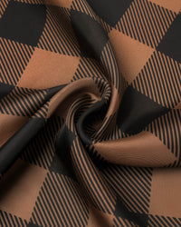 STICKYZOO cognac gingham silk scarf folded to show the soft drape of the silk and the depth of the check pattern