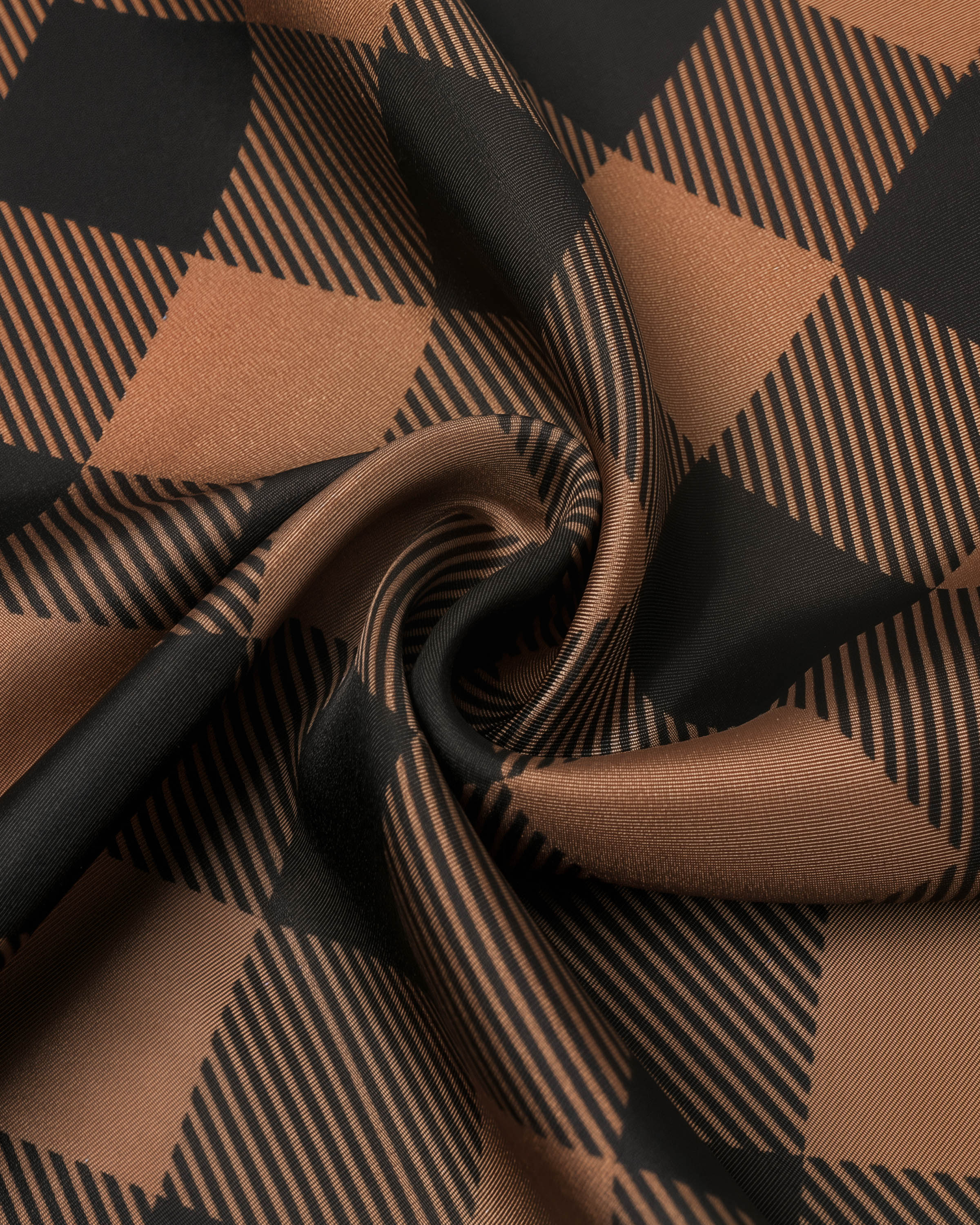 STICKYZOO cognac gingham silk scarf folded to show the soft drape of the silk and the depth of the check pattern