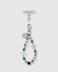 STICKYZOO Aurora Starfish phone strap laid flat: iridescent aurora and faceted blue beads, two jelly starfish, a black bead, and a silver clasp and disc