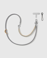 Cross-body phone strap shown with its universal phone-tab connector and safety tether