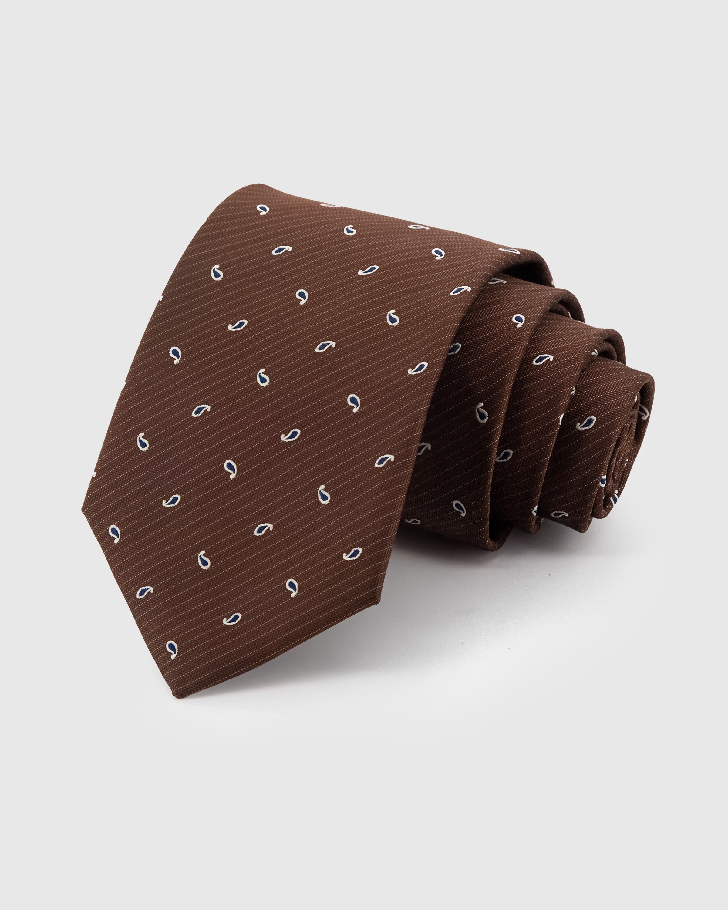 STICKYZOO Chestnut Mini Paisley Tie in hand-embroidered mulberry silk with scattered paisley drops, 45° bias-cut Italian method