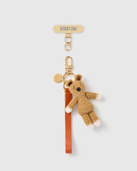 Handmade French Alran tangerine leather phone strap with hand-crochet beige bunny charm and 18K gold STICKYZOO hardware