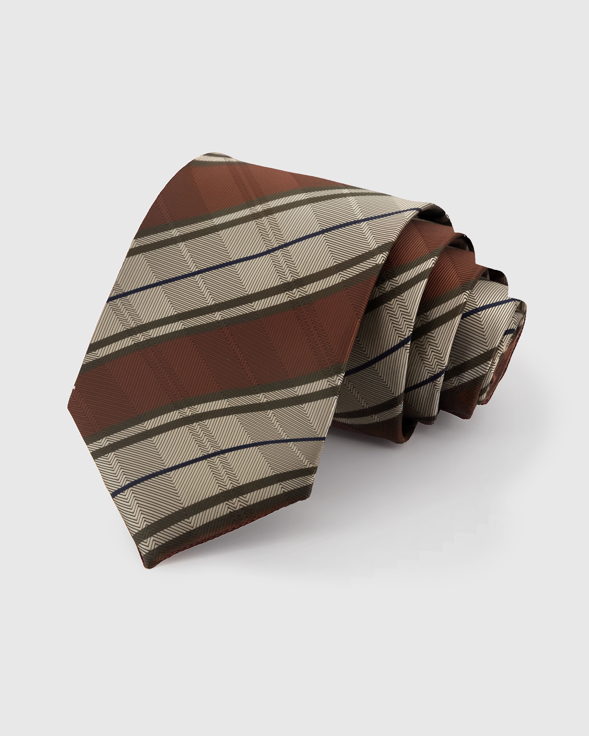 STICKYZOO Umber Herringbone Tie in hand-embroidered mulberry silk with umber and sage diagonal stripes, 45° bias-cut Italian method