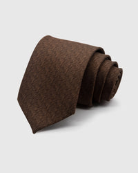 WALNUT TWEED TIE — Hand-embroidered textured solid detail on 100% mulberry silk in walnut brown, showing embroidery texture and silk sheen
