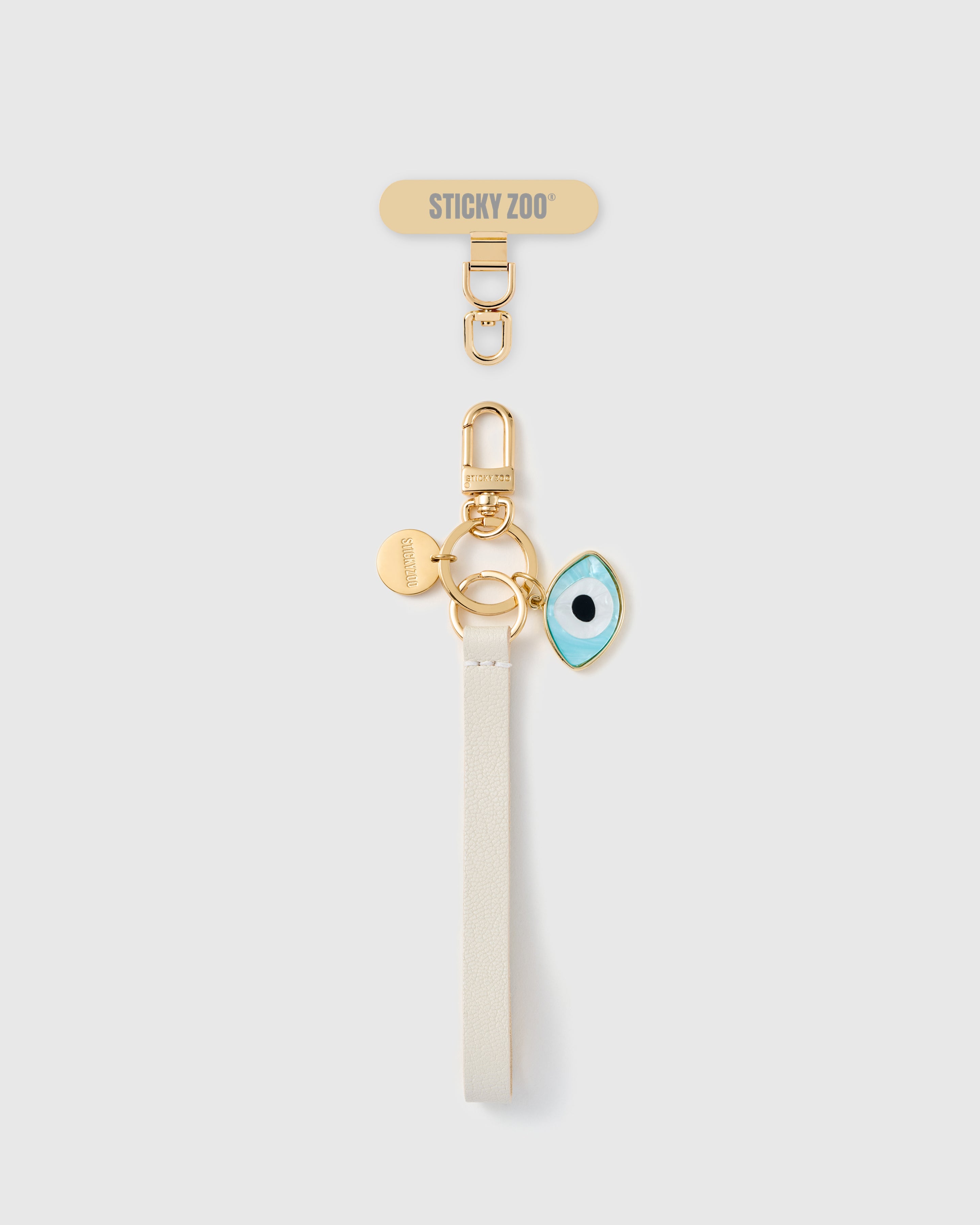 Handmade French Alran cream leather phone strap with mother-of-pearl evil eye amulet and 18K gold STICKYZOO hardware