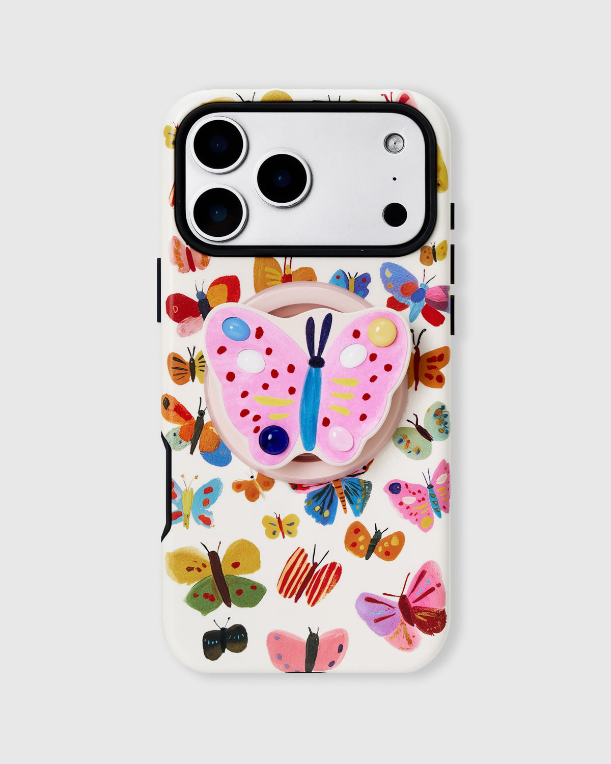 White phone case with painted butterfly print and a 3D pink butterfly MagSafe grip by STICKYZOO