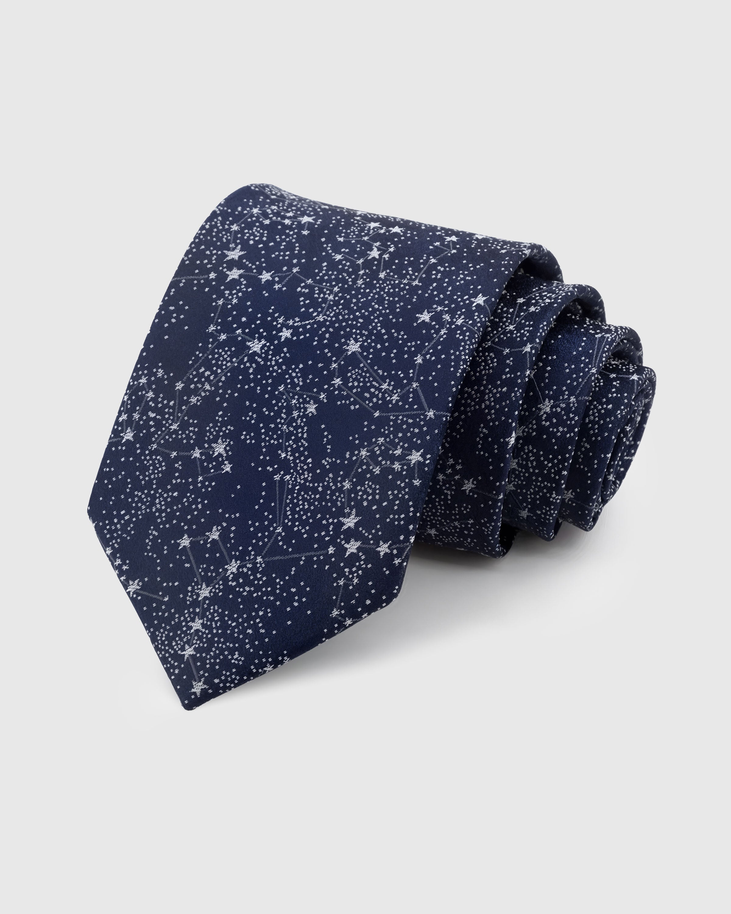 STICKYZOO NAVY CONSTELLATION TIE — 100% mulberry silk with hand-embroidered silver embroidered stars and constellation lines on deep navy ground