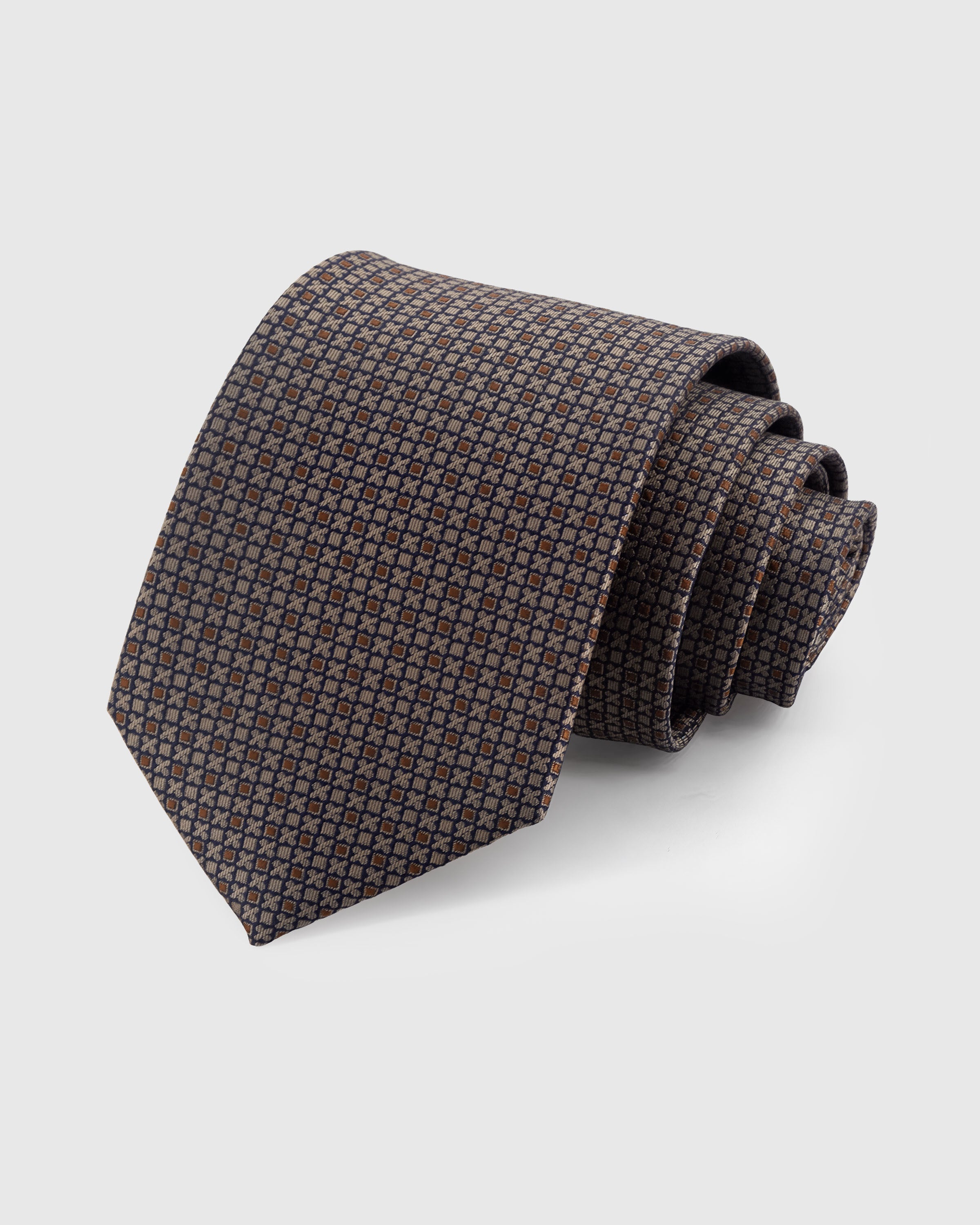 STICKYZOO TAUPE LATTICE TIE — 100% mulberry silk with hand-embroidered fine lattice of copper and navy geometric motifs on warm taupe with micro-texture ground
