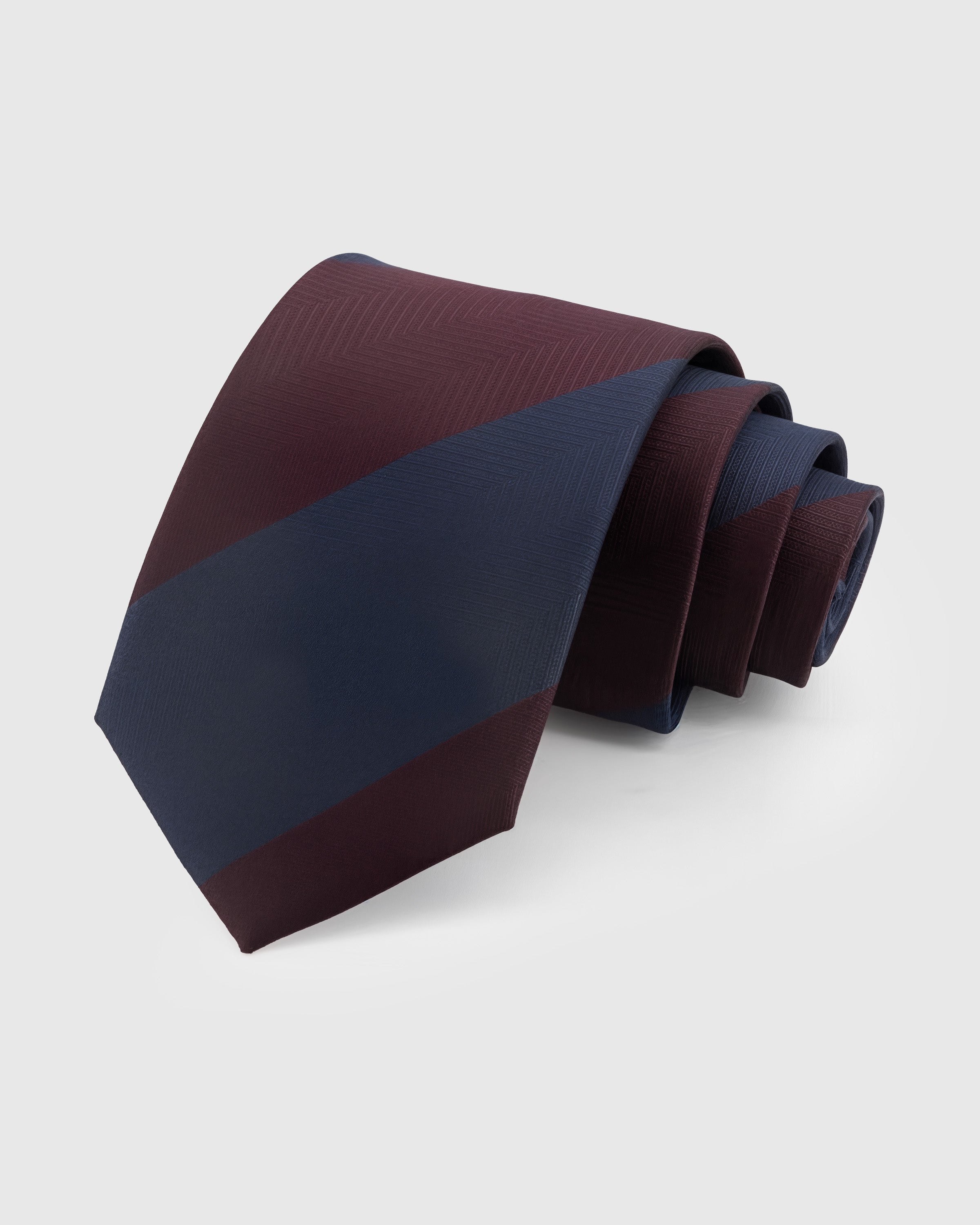 STICKYZOO Claret Block Stripe Tie in hand-embroidered mulberry silk with bold wine and navy stripes, herringbone weave, 45° bias-cut