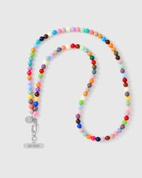 Handmade rainbow cross-body phone strap with glossy polished beads and a silver engraved STICKYZOO charm.