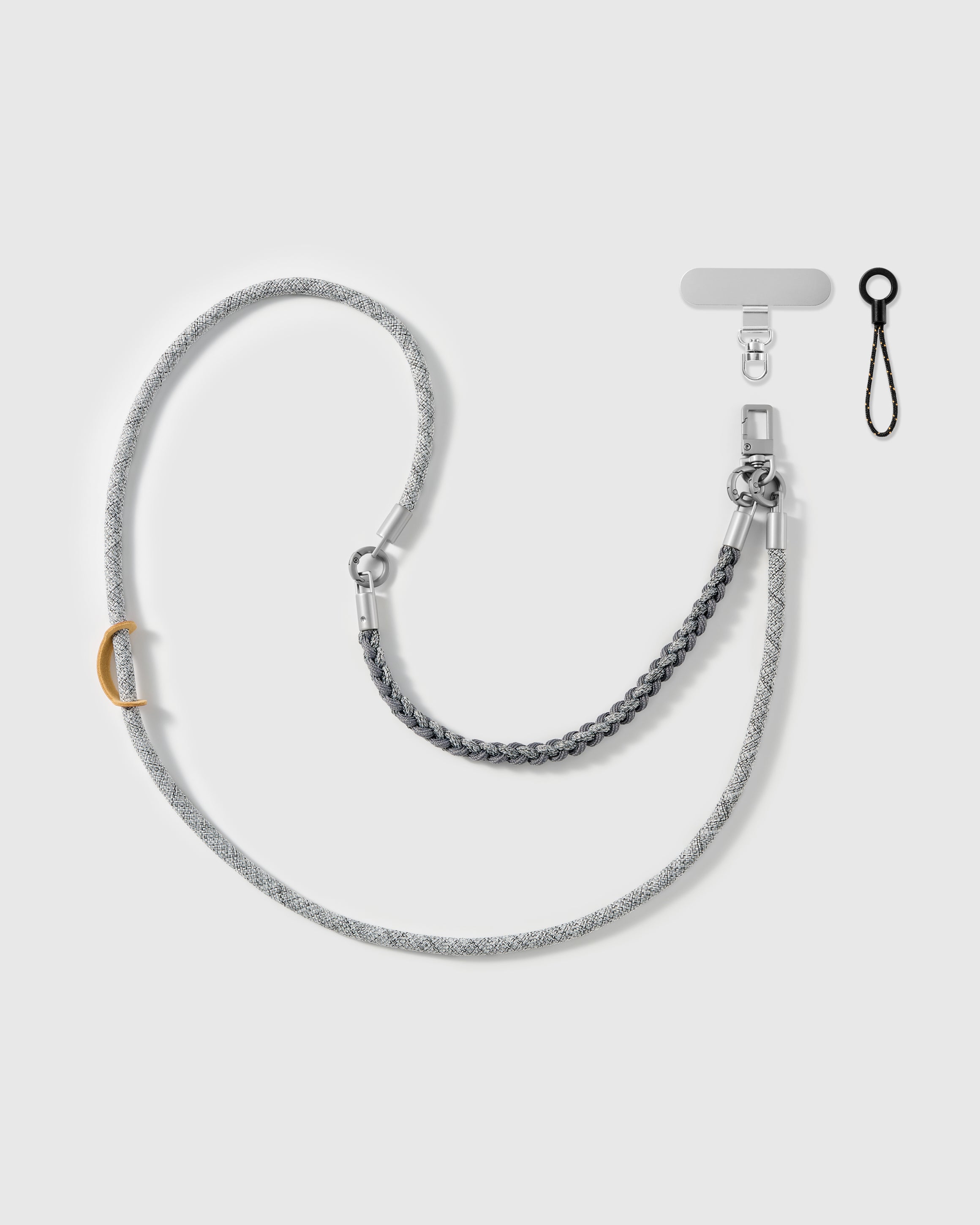 Pewter braided phone strap by STICKYZOO, worn as a wrist strap or cross-body, with silver-tone swivel hooks, a phone-tab connector and safety tether