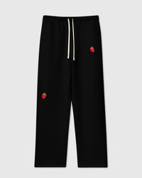 STICKYZOO Strawberry Sweatpant in black with two hand-stitched 3D plush red strawberry appliques and cream drawstring