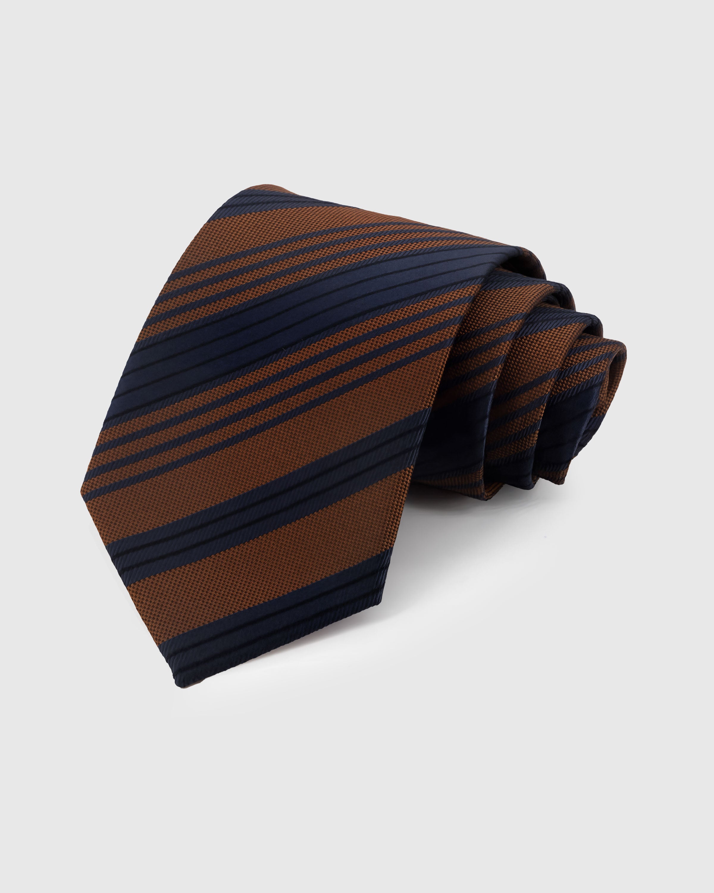 STICKYZOO Cognac Club Tie in hand-embroidered mulberry silk with cognac and navy diagonal club stripes, 45° bias-cut Italian method
