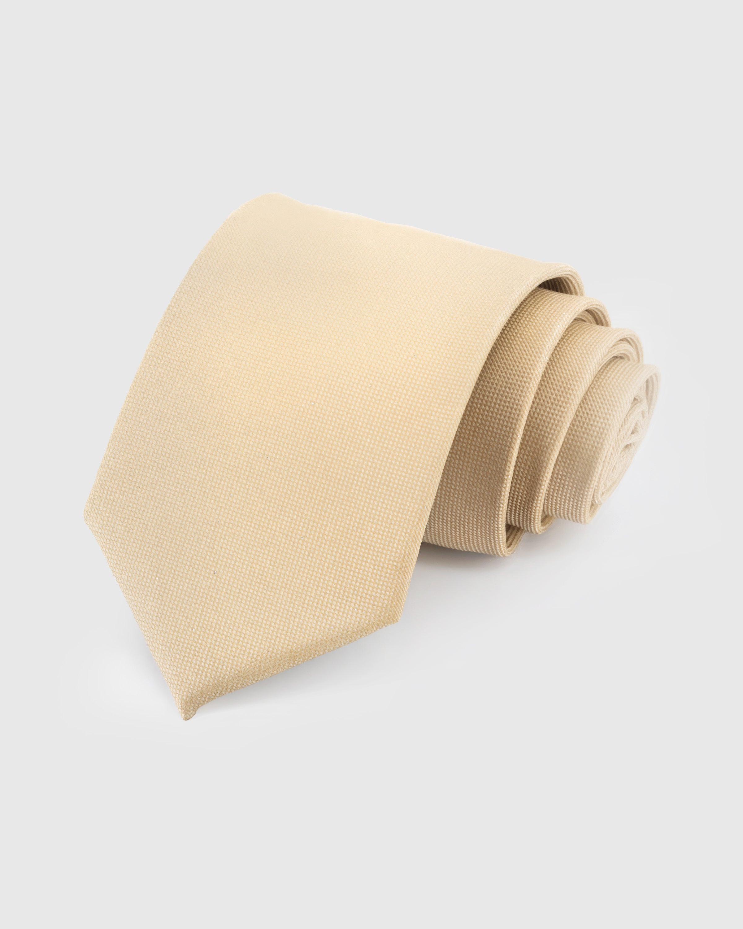 STICKYZOO Champagne Solid Tie in 100% mulberry silk with basket weave texture and warm cream finish, 45° bias-cut Italian method