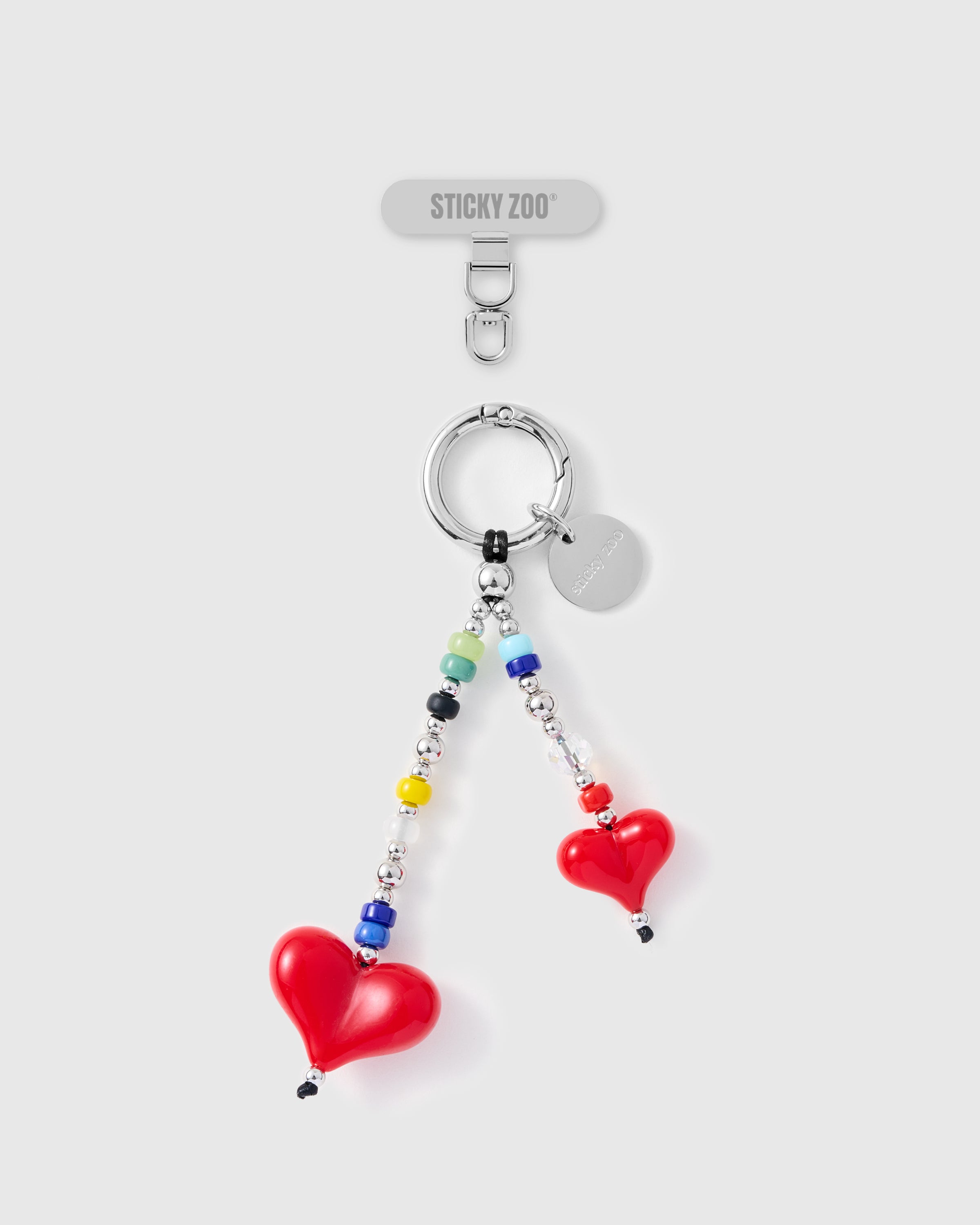 Double red heart dangle phone strap with rainbow beads and silver-tone hardware by STICKYZOO